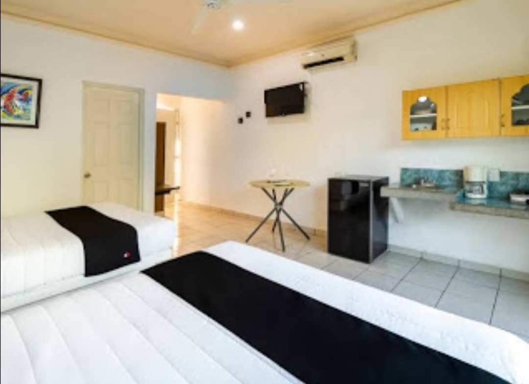 Habitación con cocineta pago extra $200 por noche